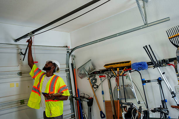 Professional Garage Door Roller Replacement technician working in Kaser, NY